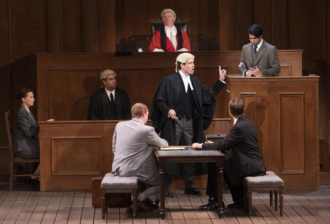 Accused murderer Leonard Vole (Taha Mandviwala) faces heavy questioning by prosecutor Mr. Myers, QC (Nick Steen) in the Idaho Shakespeare Festival performance of Agatha Christie’s “Witness for the Prosecution.”