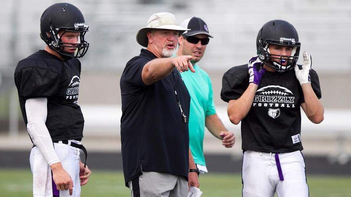 Scott Criner, center, returns as the head football coach at Rocky Mountain. He previously was the Grizzlies’ head coach from 2013 to 2016.
