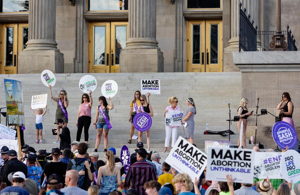 People hold a rally outside of the Idaho Statehouse in Boise in late June in support of the Supreme Court’s overturning of Roe v. Wade.