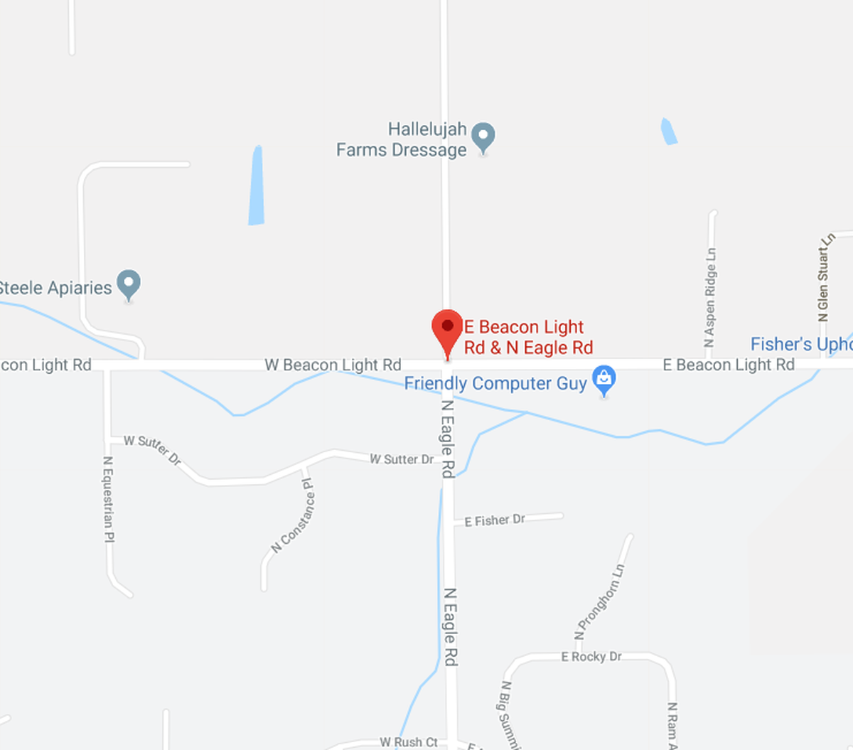A pickup and minivan collided in the intersection of Eagle Road and Beacon Light Road Friday morning. The force of the collision carried the pickup into a bicyclist.