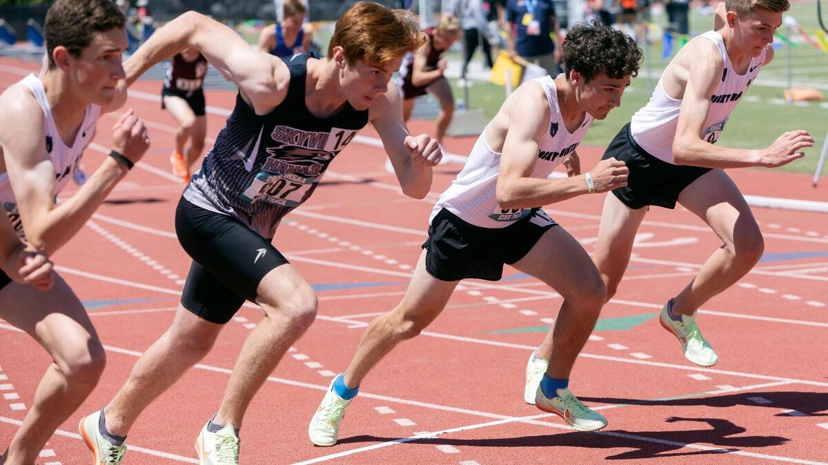 Boys take off at the start of the 5A 1,600 meters on the second day of the Idaho high school state track and field championships held on May 21 at Dona Larsen Park.