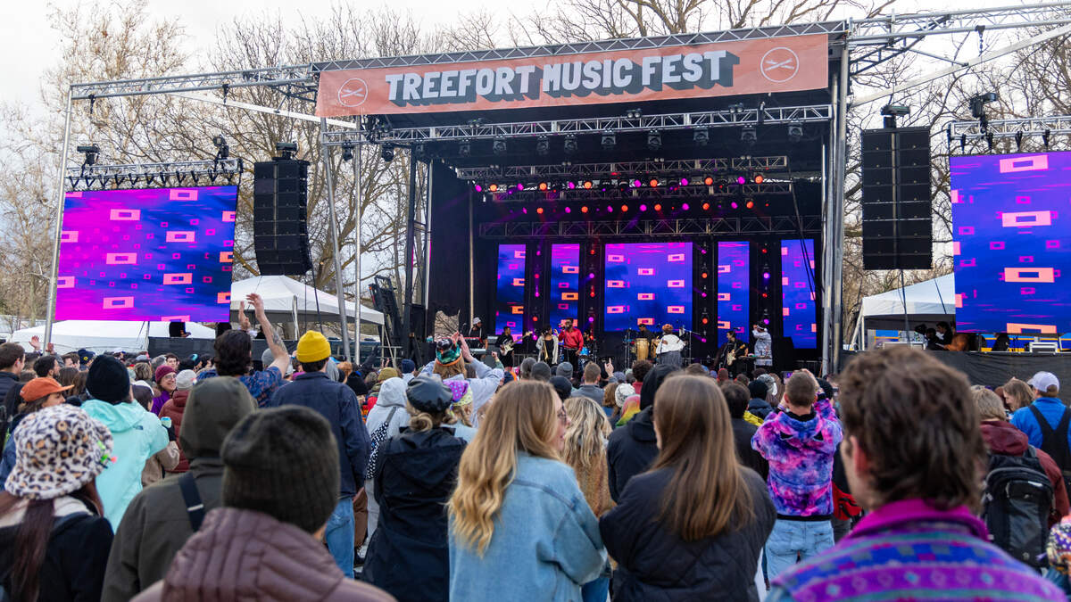 A crowd attends a performance by Cimafunk at Treefort Music Fest in 2024.