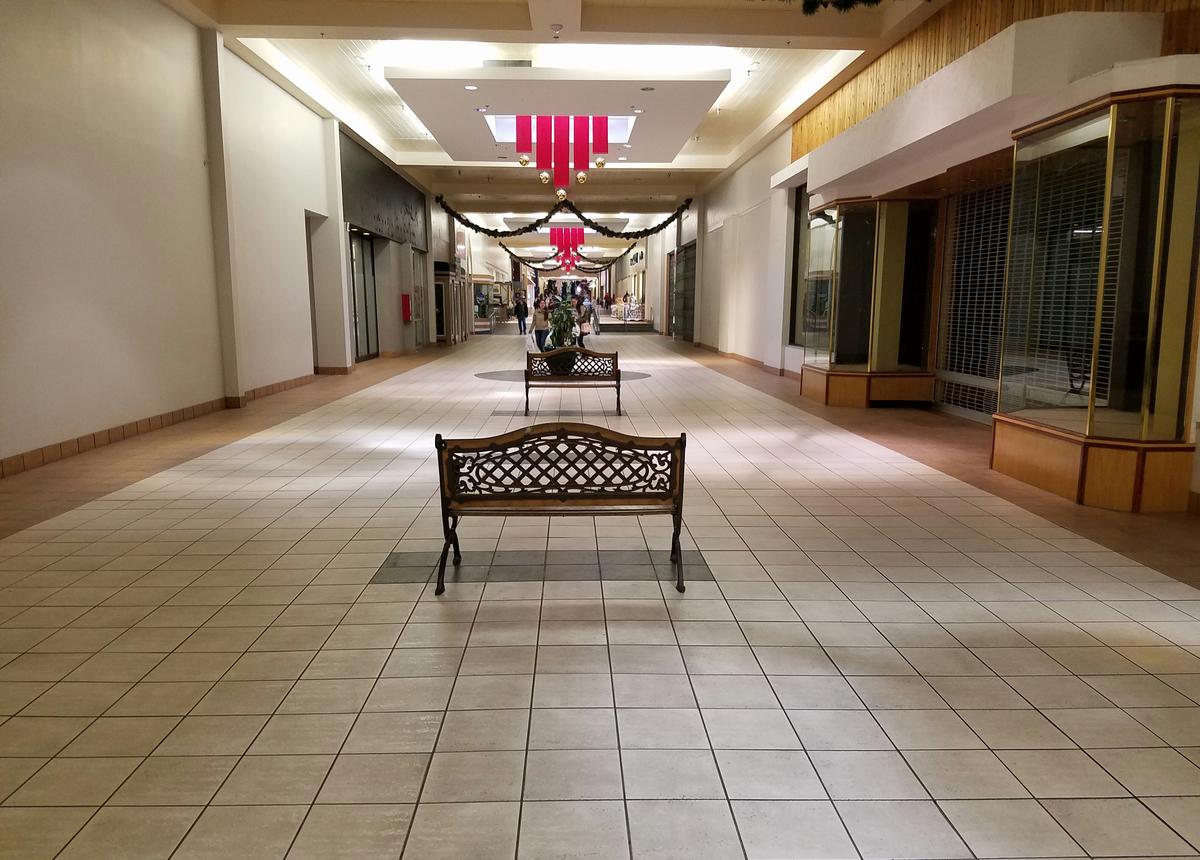 The main corridor at Karcher Mall is nearly empty on a recent Saturday afternoon. While the Boise Towne Square and The Village at Meridian were teeming with holiday shoppers on the same day, Karcher attracted far few customers.