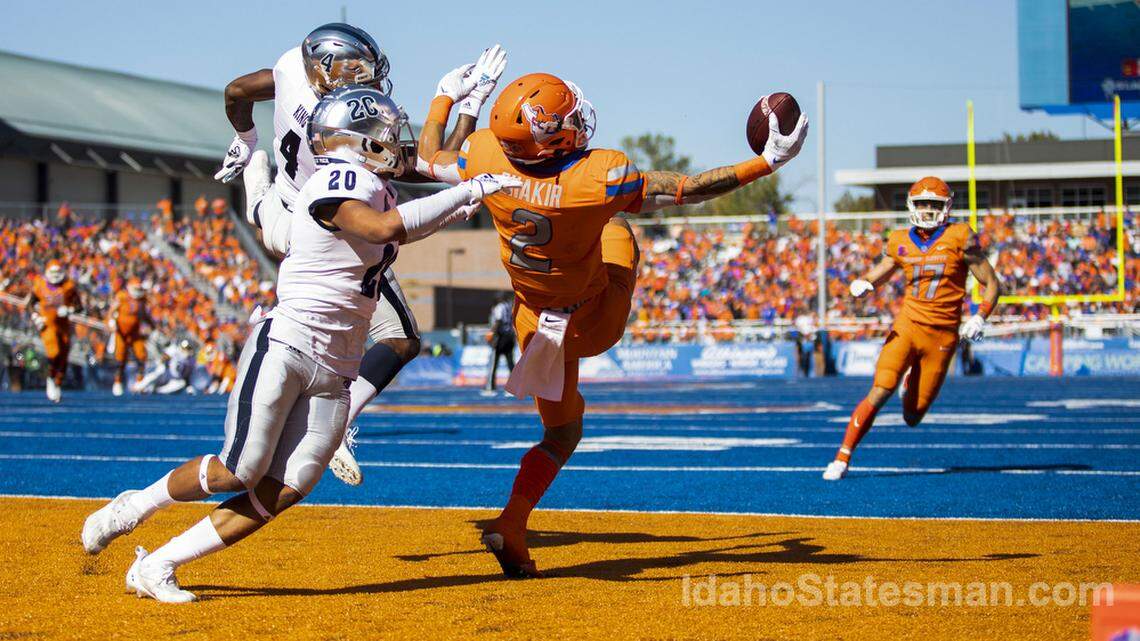 Boise State wide receiver Khalil Shakir hauls in a 23-yard touchdown pass against Nevada in the first half of Saturday’s game at Albertsons Stadium.