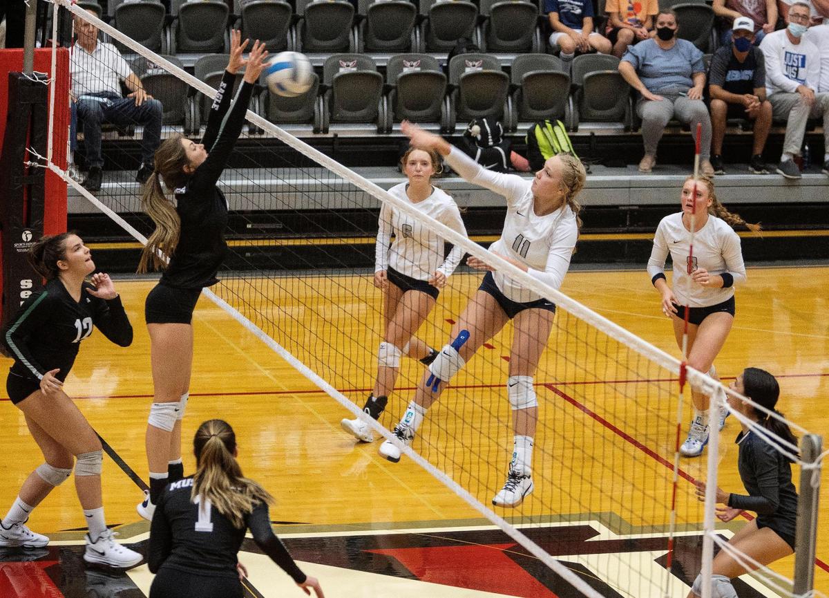 Skyview’s Brinley Perrine spikes the ball against Eagle at Northwest Nazarene University’s Johnson Center.