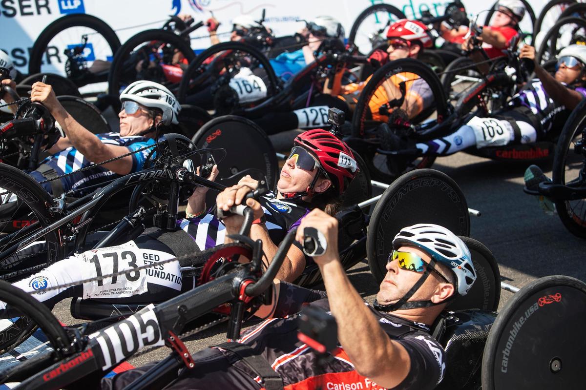 Cyclists in handcycles line up at the start of the Paracycle National Championship race at the Twilight Criterium in downtown Boise on Saturday.