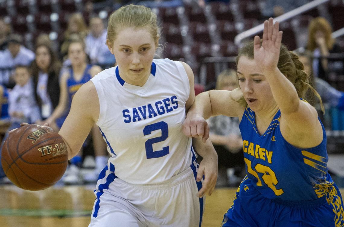 Salmon River’s Lotus Harper is fouled by Carey’s Athana Versis during last year’s 1A Division II state title game.