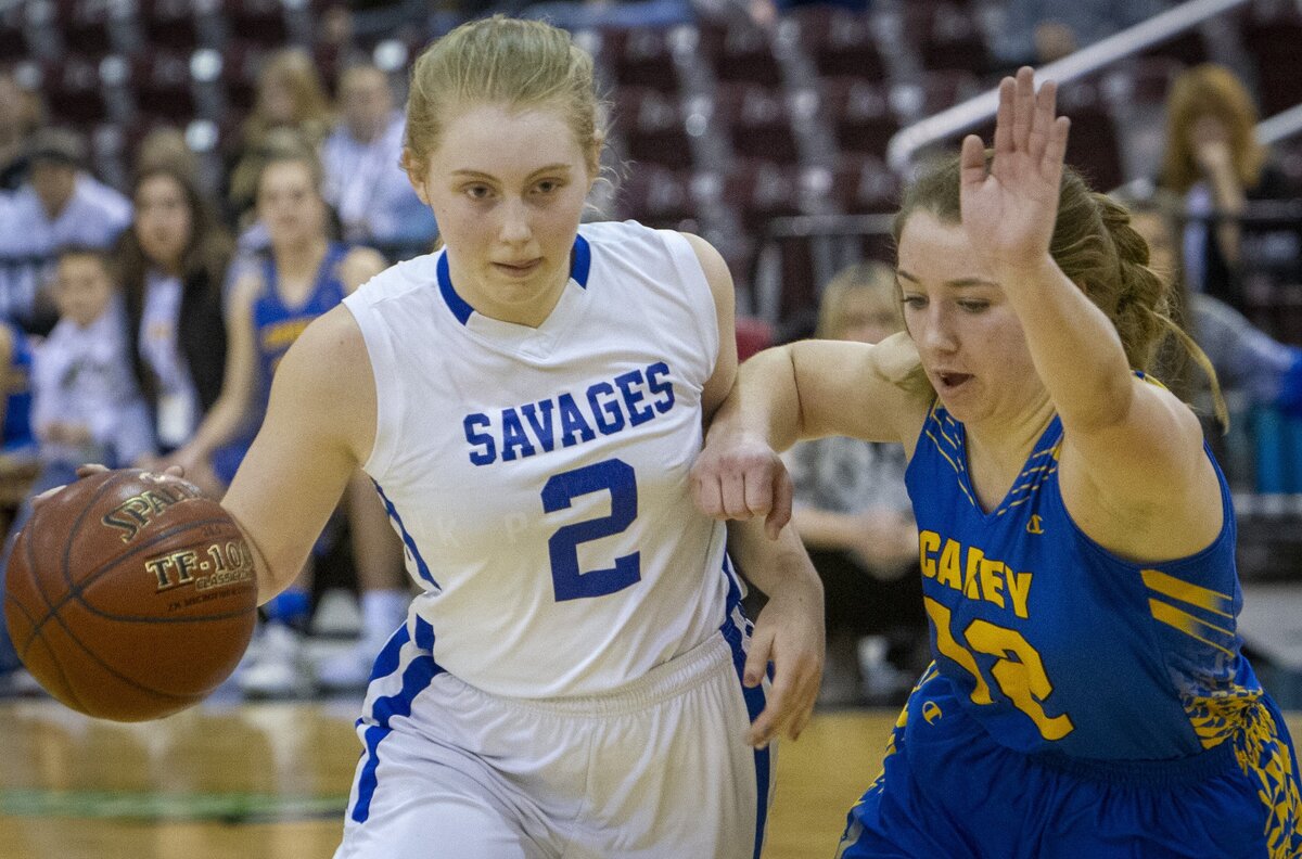 Salmon River’s Lotus Harper is fouled by Carey’s Athana Versis during last year’s 1A Division II state title game.