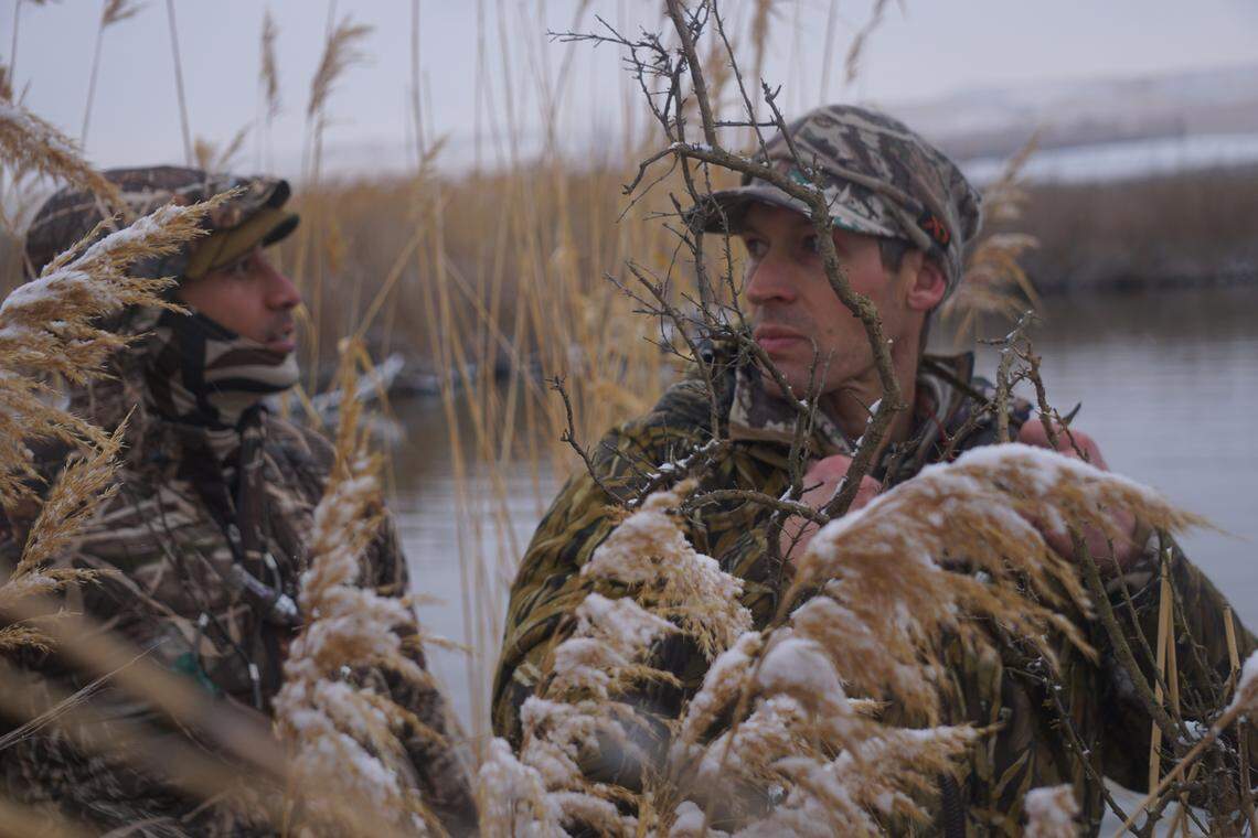 Ian Malepeai, left, and Brad Brooks regroup during a duck hunting trip near Bruneau on Jan. 15, 2019. Both Malepeai and Brooks grew up hunting, and in their roles at outdoor advocacy groups, they hope to encourage others to take up the practice.