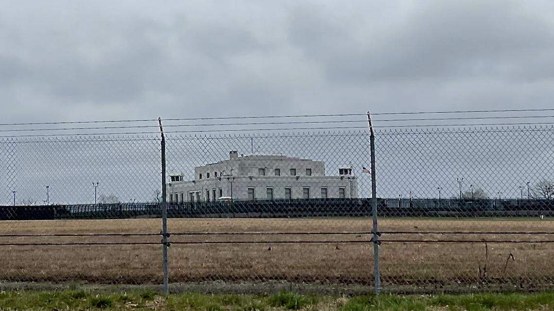 A chain-link fence topped with barbed wire surrounds the U.S. Bullion Depository at Fort Knox, Kentucky, 30 miles southwest of Louisville and next to a U.S. Army garrison.
