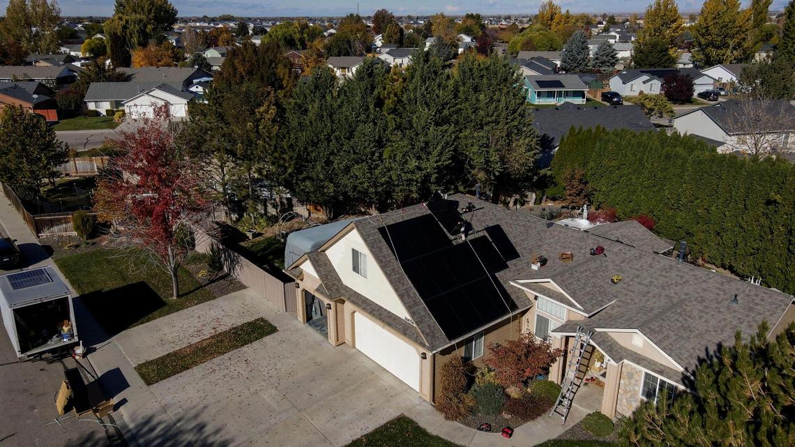 Sun Driven Solar installs solar panels onto the roof of a Nampa home.