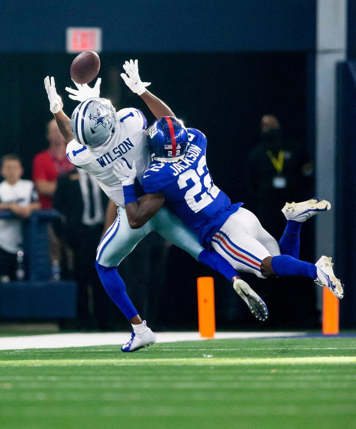 Dallas Cowboys wide receiver Cedrick Wilson catches a pass as New York Giants cornerback Adoree’ Jackson defends during their game Oct. 10 in Arlington, Texas. Dallas won 44-20.
