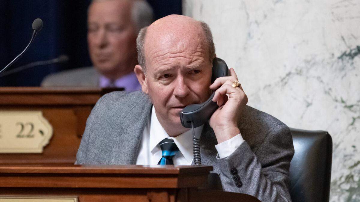 House Speaker Mike Moyle, R-Star, then House majority leader, speaks on the phone on the House floor at the Idaho Capitol on April 6, 2021.