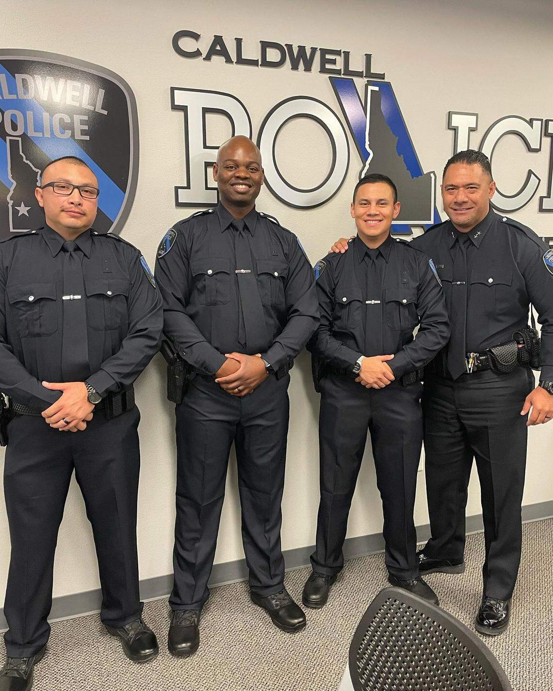 A photo of four Caldwell Police Officers during their swearing-in ceremony. The officers from left to right: Moises Montes, Dwight Penkey, Nilton Melara and Shawn Sopoaga.