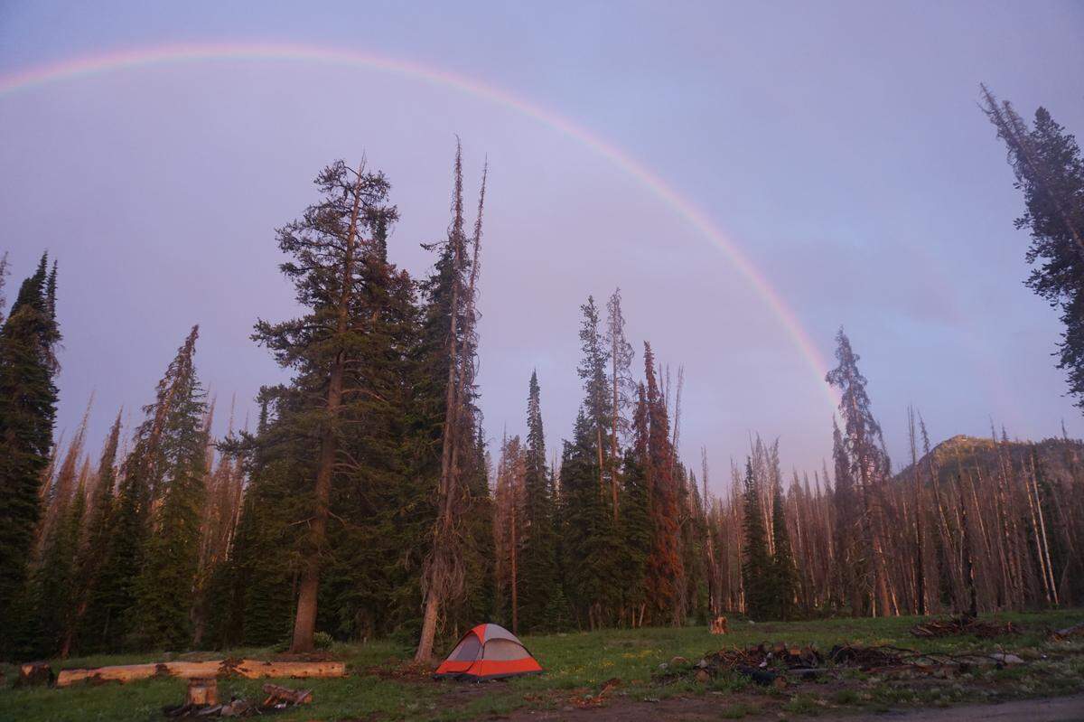 A rainbow is visible over outdoor reporter Nicole Blanchard’s tent near Big Trinity Lake on July 26, 2019. It’s not the only rainbow in the area -- Big, Middle and Little Rainbow lakes are accessible from the nearby Rainbow Basin Trail.