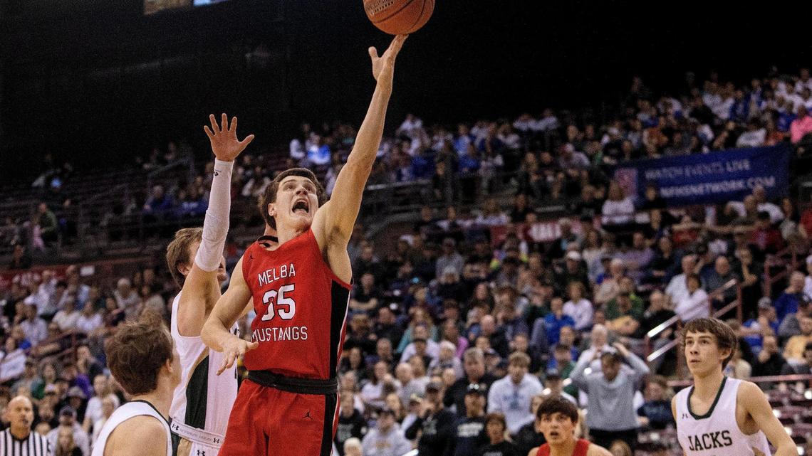 Melba senior Joe Reiber makes a basket in the first half against St. Maries. Reiber scored 22 points.