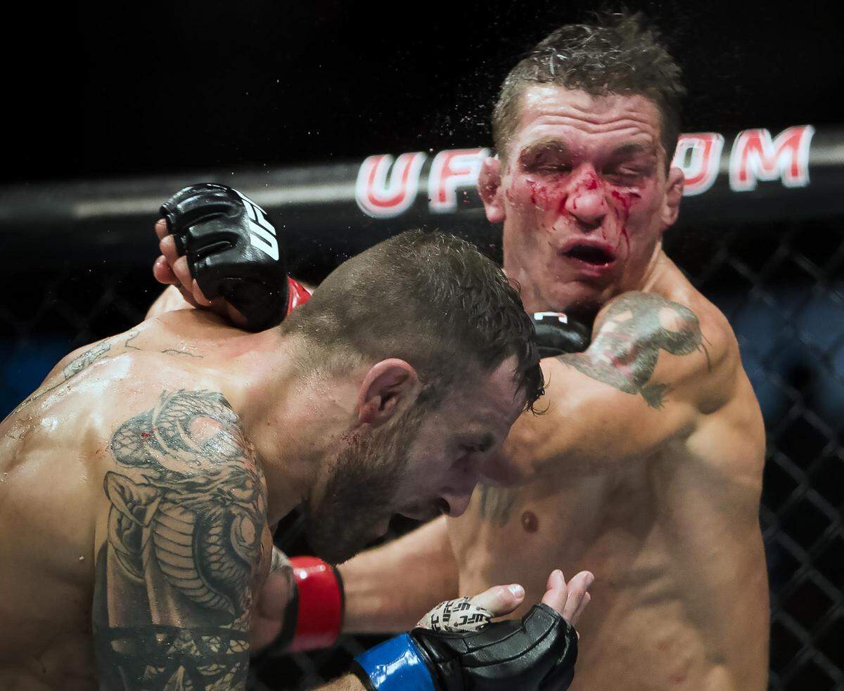 Alexander Volkanovski, left, defeats Darren Elkins by unanimous decision in a featherweight bout at UFC Fight Night 133 on Saturday night at CenturyLink Arena in Boise.