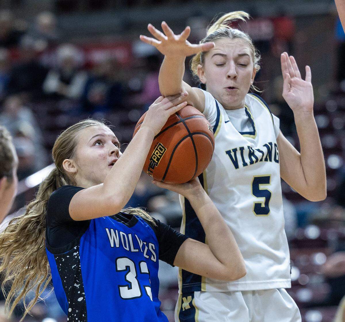 Middleton guard Cadence Steele blocks a shot by Timberline's Bailey Pearson in the first round of the 6A girls basketball state tournament at Ford Idaho Center in Nampa, Thursday, Feb. 19, 2026.