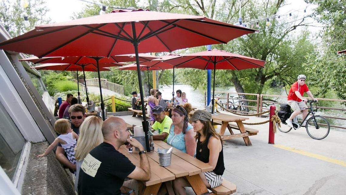 Patrons enjoy a little scenery with their crab legs on the patio of Joe’s Crab Shack.
