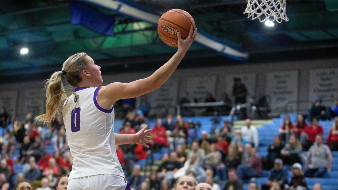 Rocky Mountain senior Brielle Magnuson scores two of her game-high 22 points in a 62-46 win over Owyhee on Saturday that clinched the Grizzlies a 5A state tournament berth.