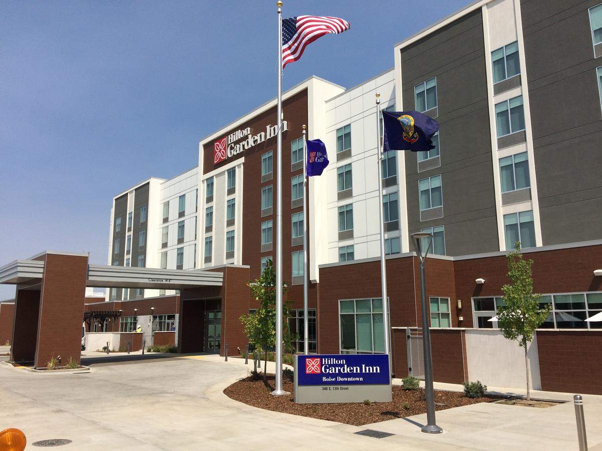 The newly opened Hilton Garden Inn at 13th and Front streets in Gardner Co.’s Pioneer Crossing development. A Panera Bread restaurant in the development also just opened. A parking garage opened months ago, and an office building is under construction.