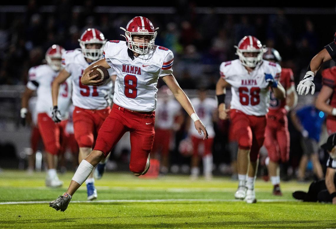Nampa quarterback Gabe Navarro breaks loose in the fourth quarter of the Bulldogs’ 26-24 win at Owyhee on Friday.