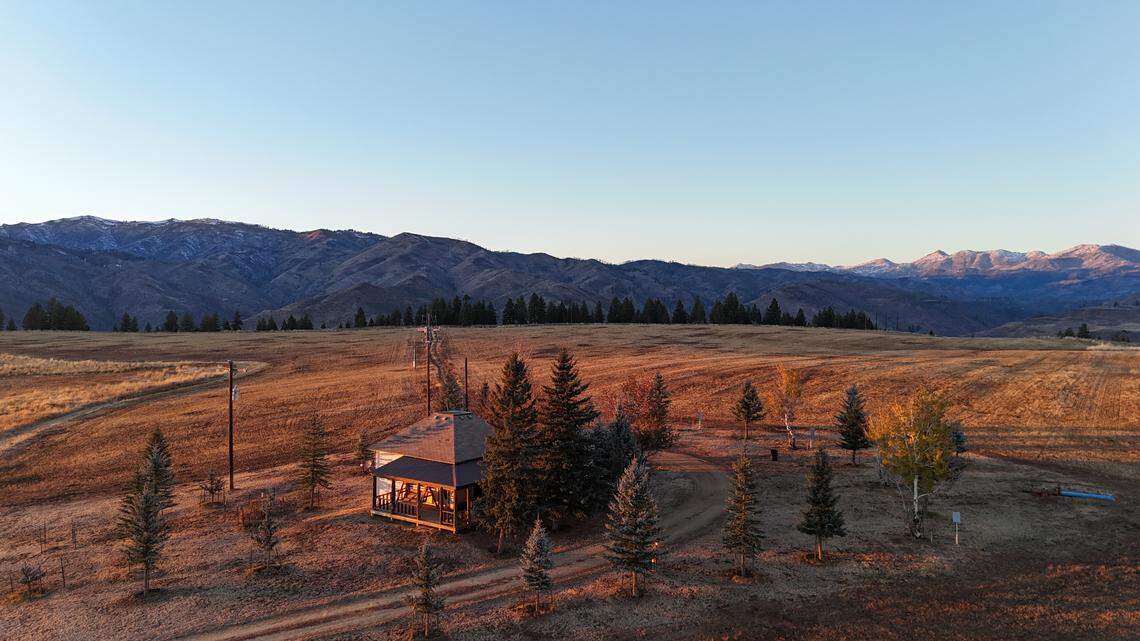 The property includes three farm houses and two cabins.