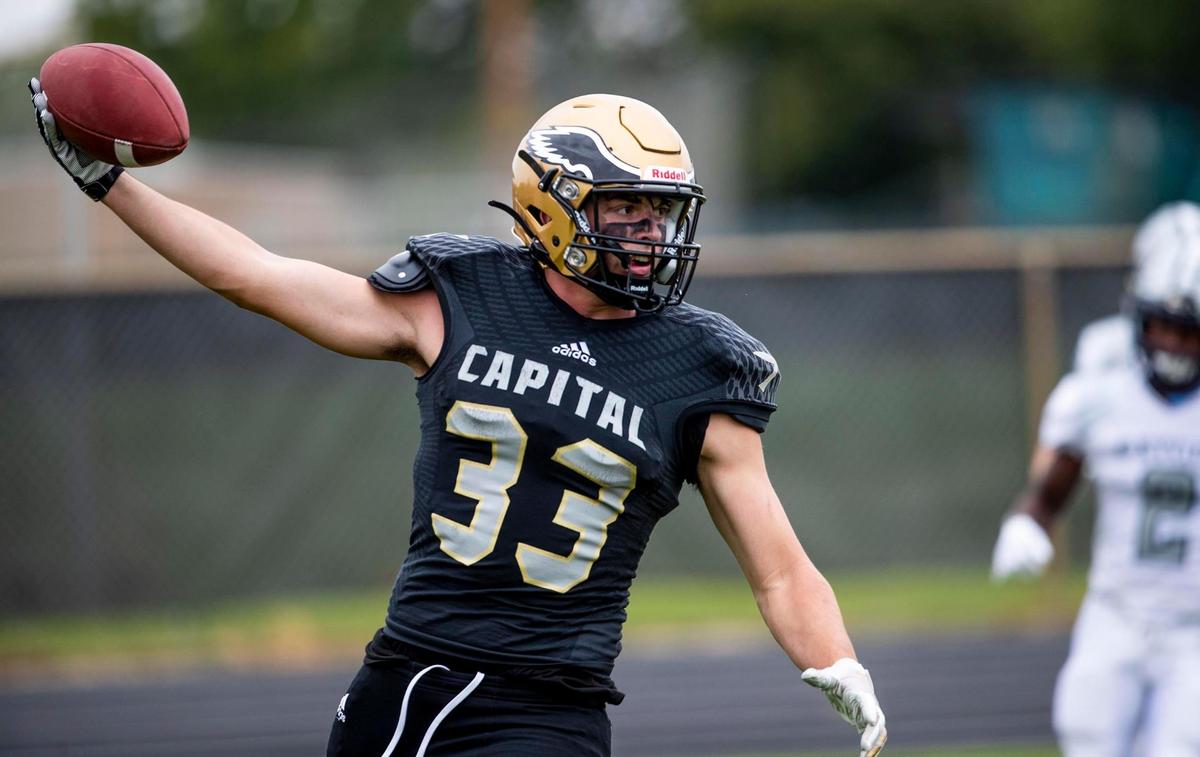 Capital wide receiver Jackson Reed flies into the end zone untouched, scoring one of four receiving touchdowns against Skyview on Friday.