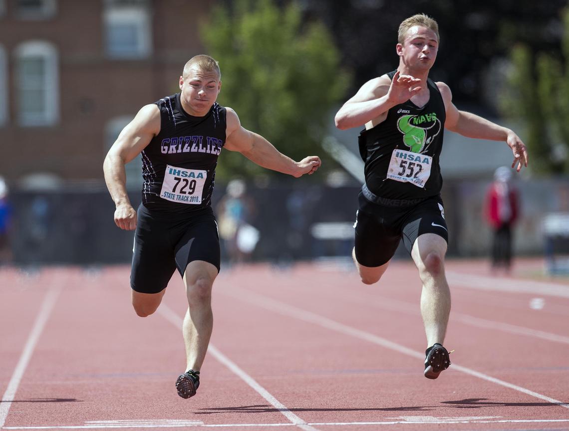 Rocky Mountain senior Carter Kuehl edges Mountain View's Magnus Hemingway in the 5A boys 100 finals Saturday at Dona Larsen Park.