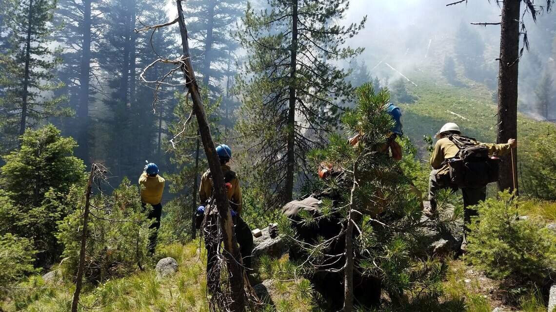Idaho 21 reopens as two wildfires continue burning alongside the road
