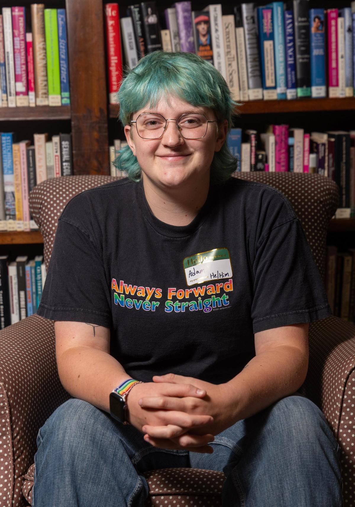 Adam Thompson, 19, volunteers in the library at The Community Center in Boise.