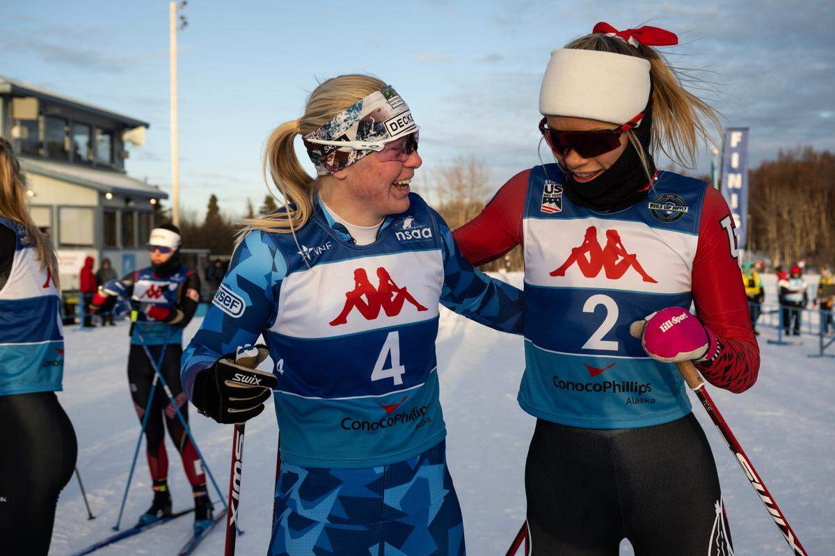 Boise native Sammy Smith, left, is congratulated by Sweden’s Erica Laven after winning a national title in the classic sprint at the U.S. Cross Country Ski Championships on Saturday in Anchorage, Alaska.