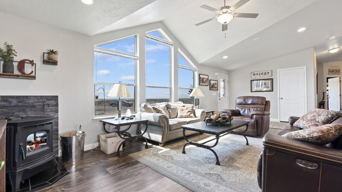 The property includes a four-bedroom, two-bathroom house.