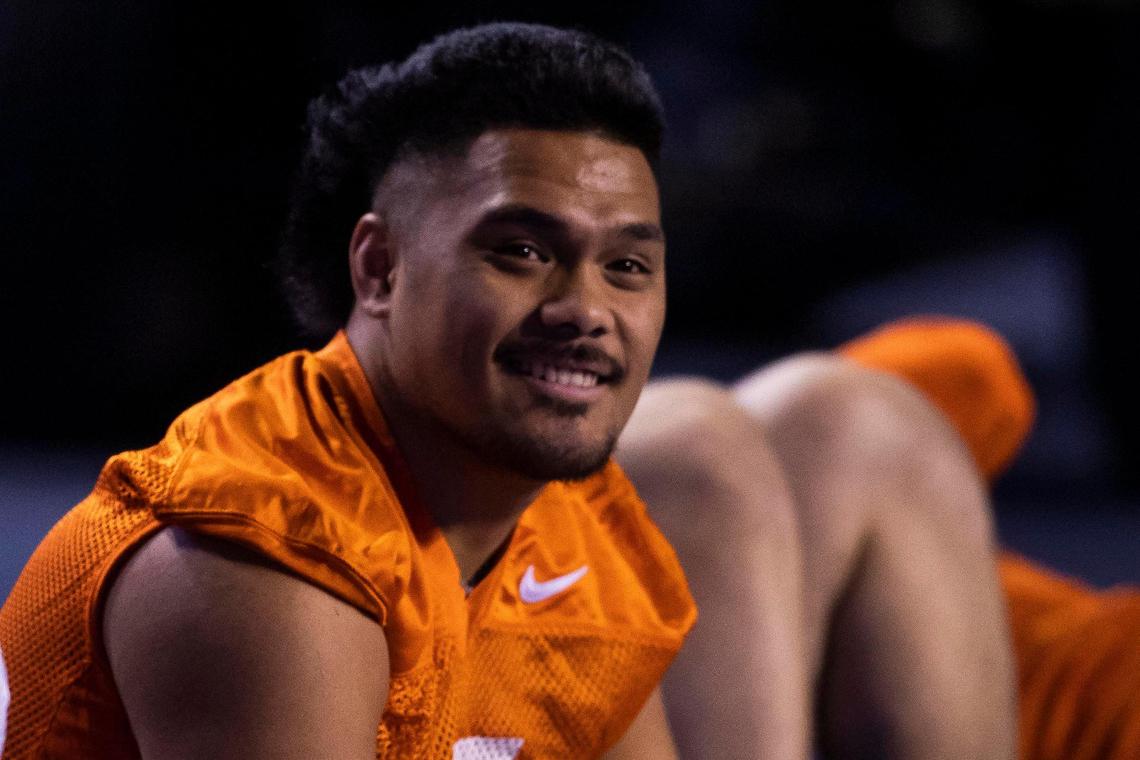 Boise State linebacker Ezekial Noa, still recovering from an injury last season, watches the men’s basketball team play in the Mountain West tournament on the jumbo screen as he limits his work out. The Broncos held their first spring practice Friday, March 6, 2020 at Albertstons Stadium in Boise.