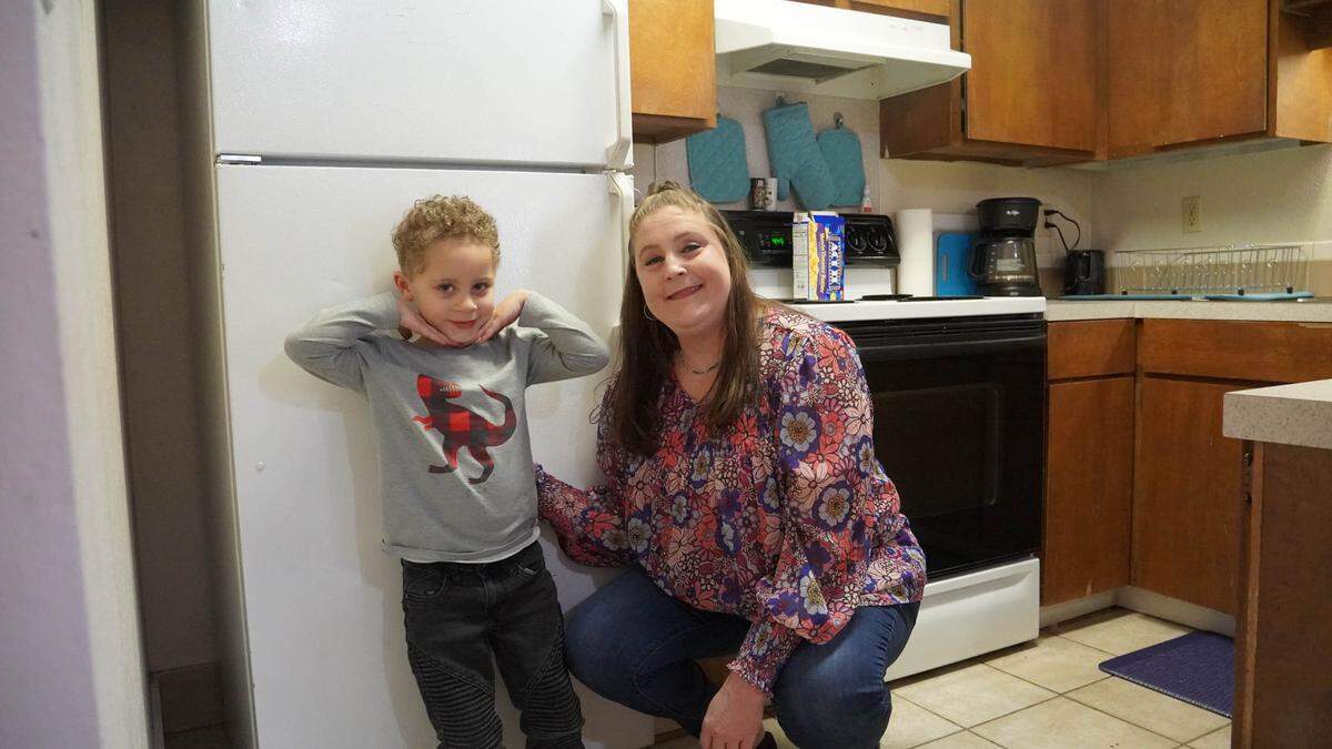 Isaiah, left, and Heidi spend time together in their Boise Rescue Mission apartment in Nampa. The mission runs dozens of apartments for people exiting homelessness in the Treasure Valley.