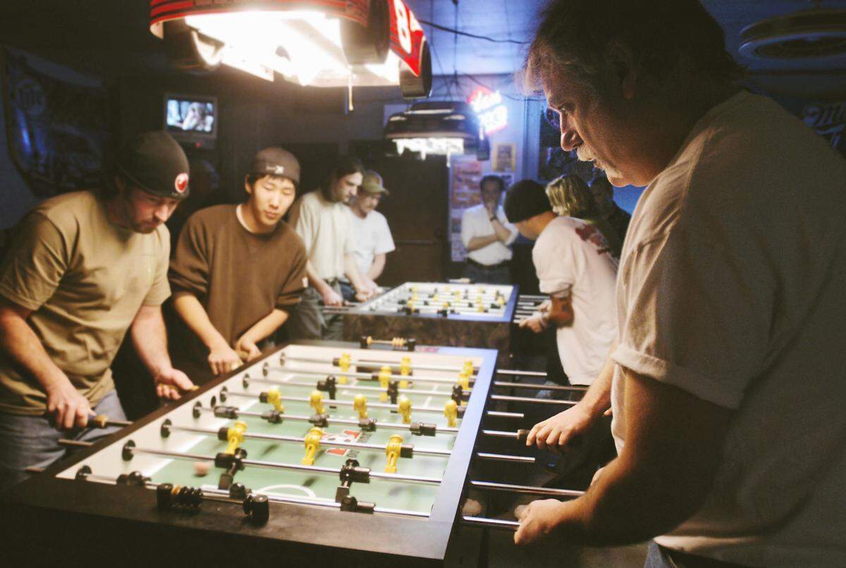 Back in the day: Local foosball players used to crush balls and beers during weekly draw-your-partner tournaments at the Dutch Goose.