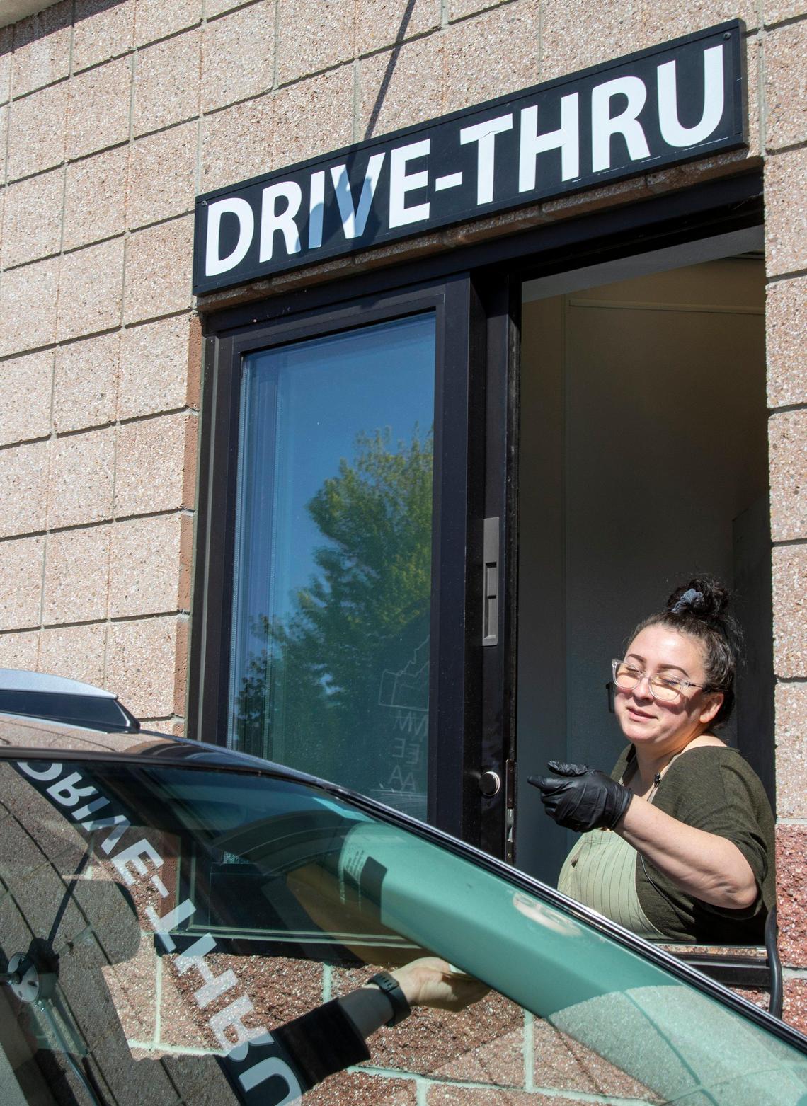 Idaho Meat and Seafood has been able to stay business open because it has a drive-up window to serve customers without letting them inside.