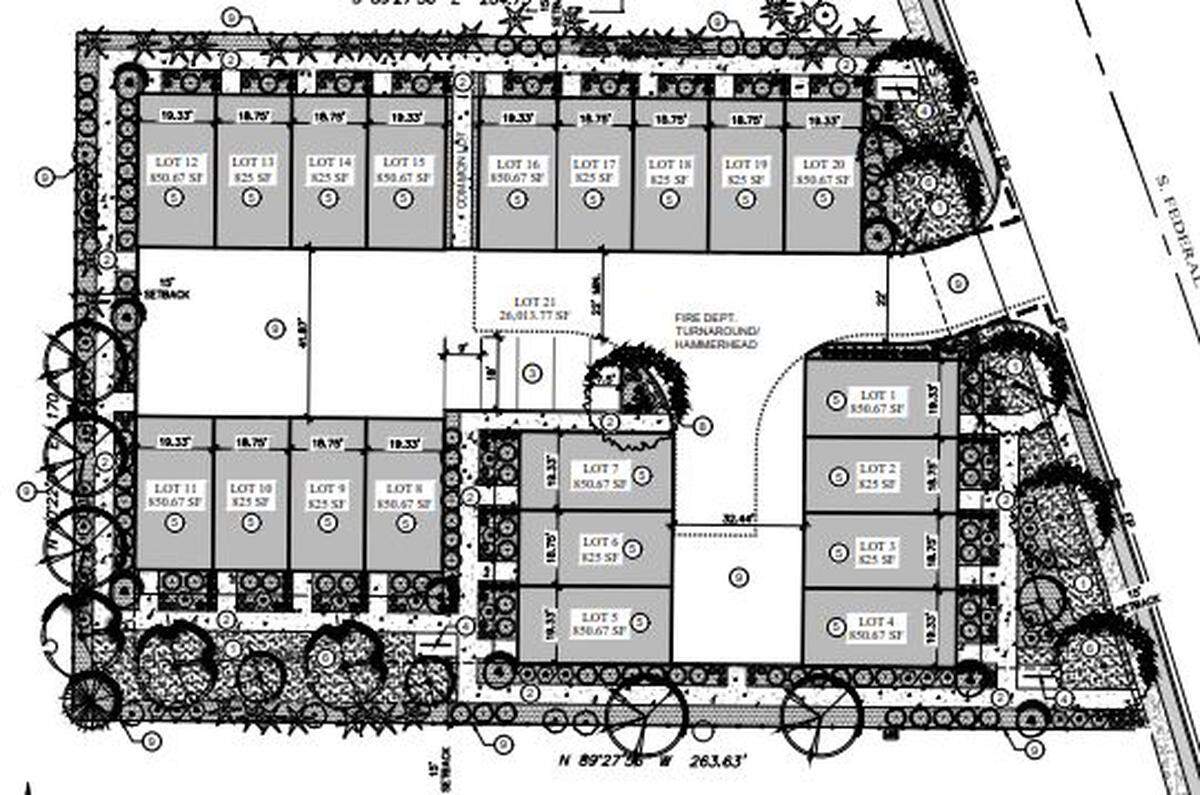 CK Property Group of Boise is seeking a zone change for a 20-unit townhouse development on South Federal Way. A shared driveway would give residents access to two-car garages for the three-story residences.