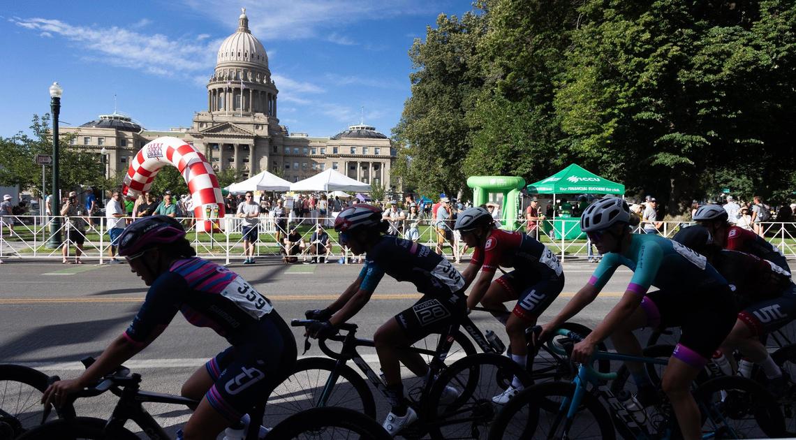 Cyclists in the Women’s Pro category 1/2 race ride past the Idaho State Capitol during the Twilight Criterium on Saturday in downtown Boise.