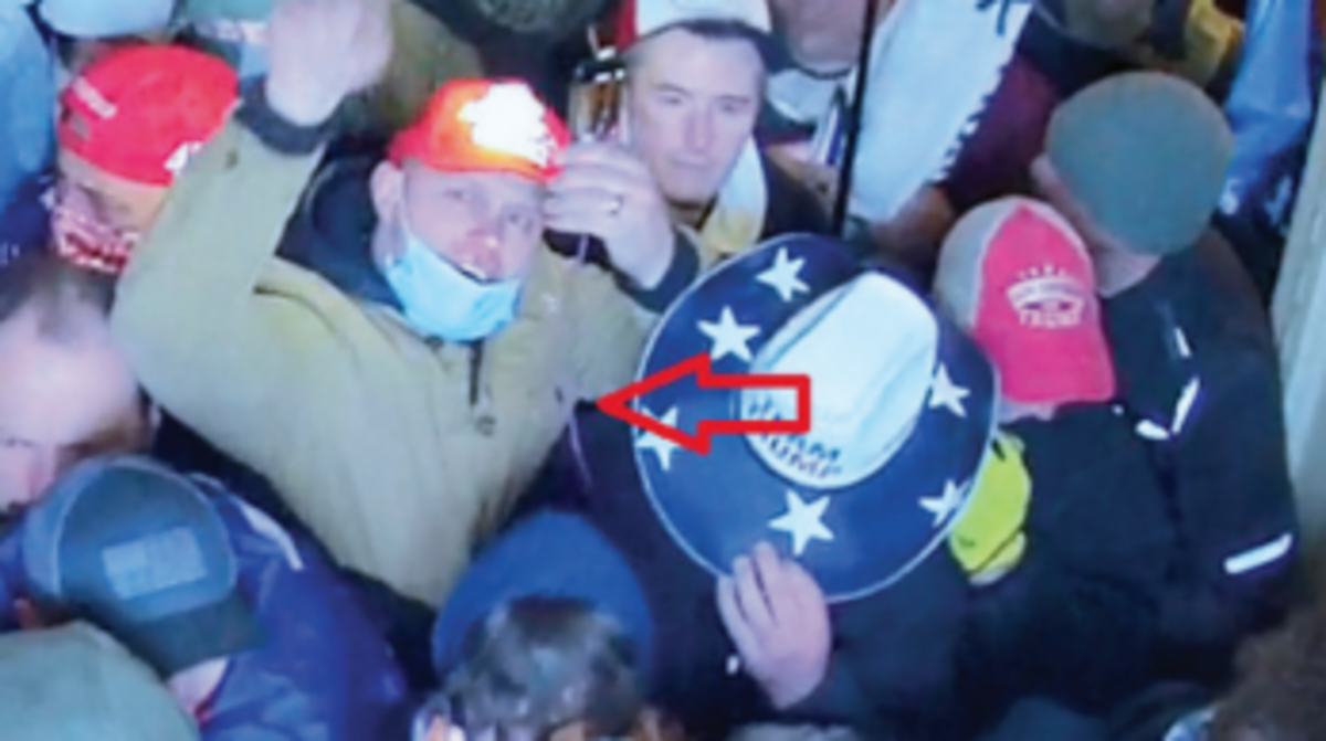 Idaho Falls resident Tyler Tew, center, has been sentenced to probation for his role in the Jan. 6 Capitol riot.