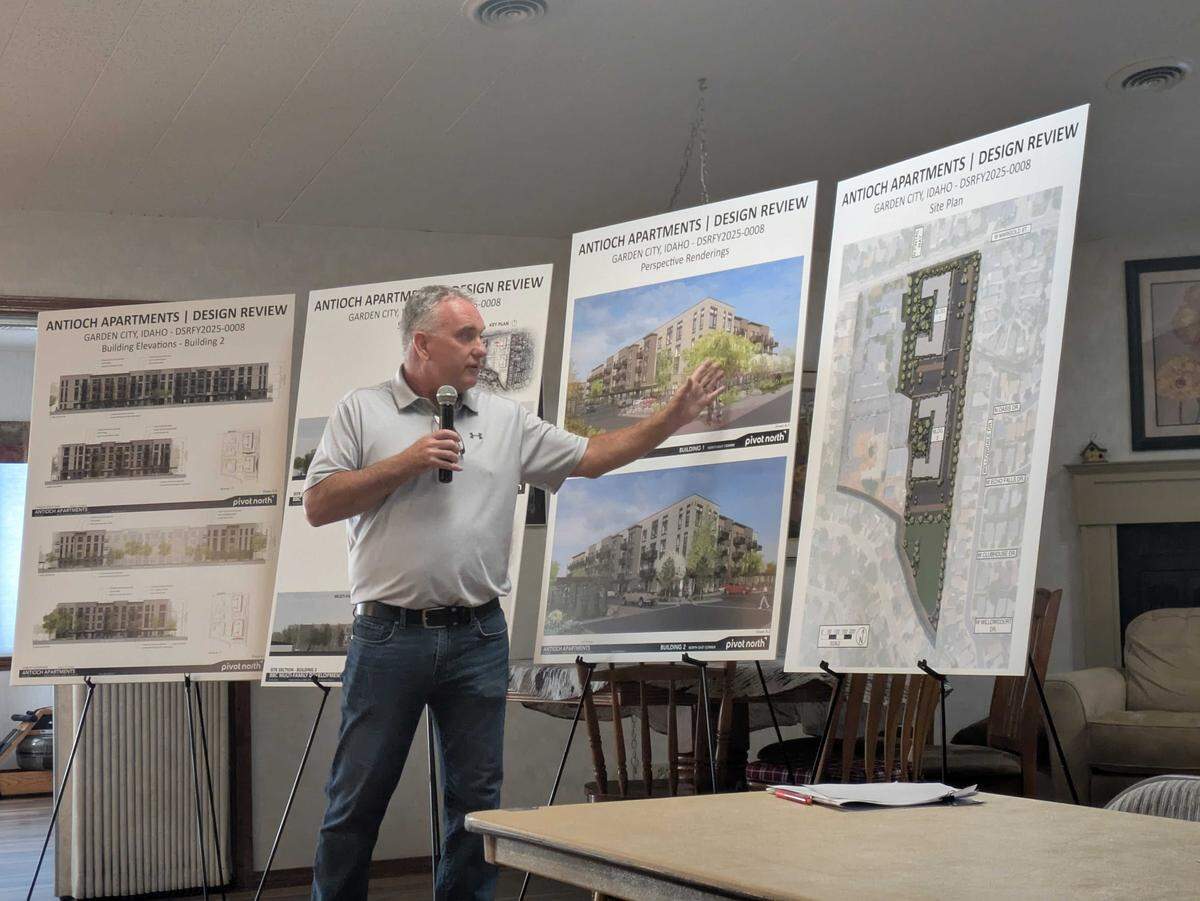 John Rennison, of Eagle-based Rennison Cos., talks the crowd at a neighborhood meeting through the proposed 236-unit project.