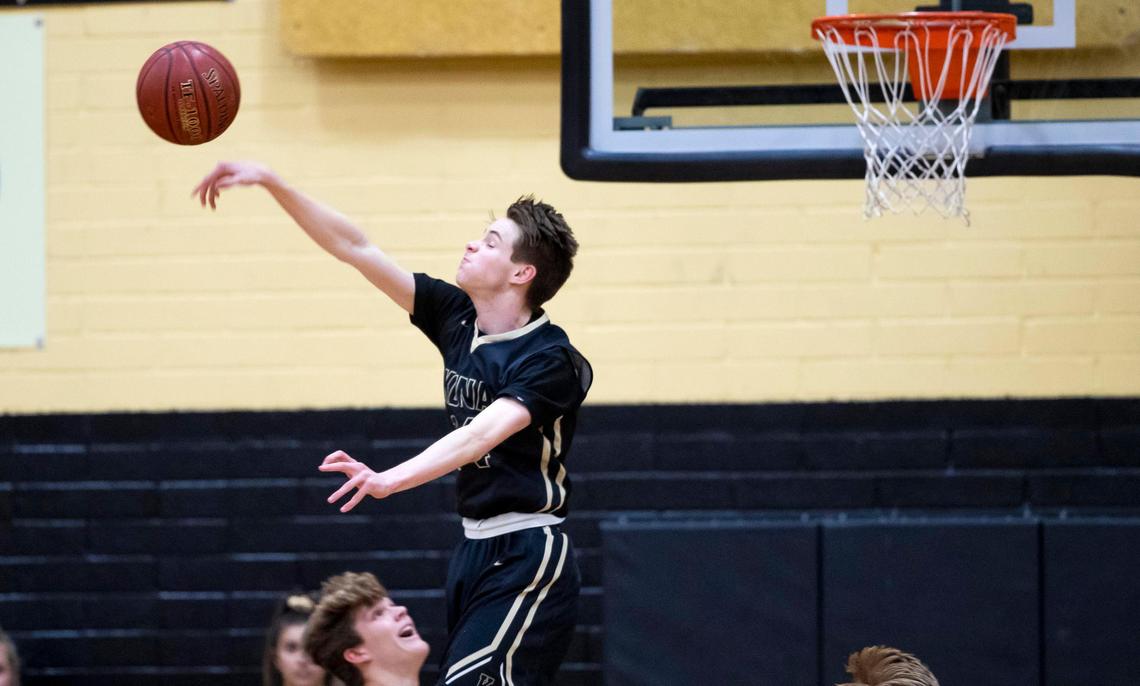 Kuna senior Zach Williams blocks a Middleton pass in the 4A District Three championship Thursday, Feb. 27, 2020 at Kuna High School.