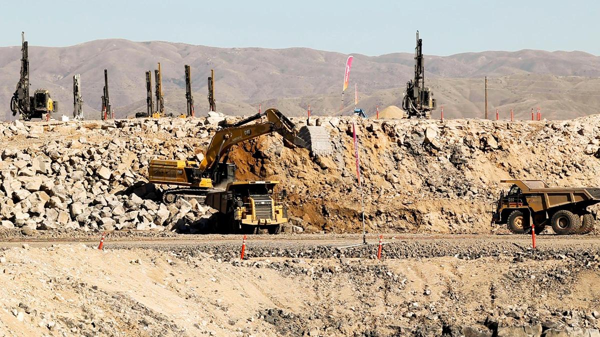 As crews work a few hundred yards away, Micron celebrates the construction of its new fab facility with a ceremonial cement pour, and plaque setting, Thursday, Oct. 5, 2023, in East Boise.