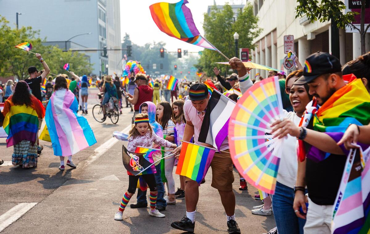 People of all ages lined the streets downtown to watch the parade for the Boise Pride Festival on Sunday, Sept, 11, 2022. The Fred Meyer Pride Parade circled through downtown Boise with nearly 70 entries ranging from small organizations walking the route to corporate floats.