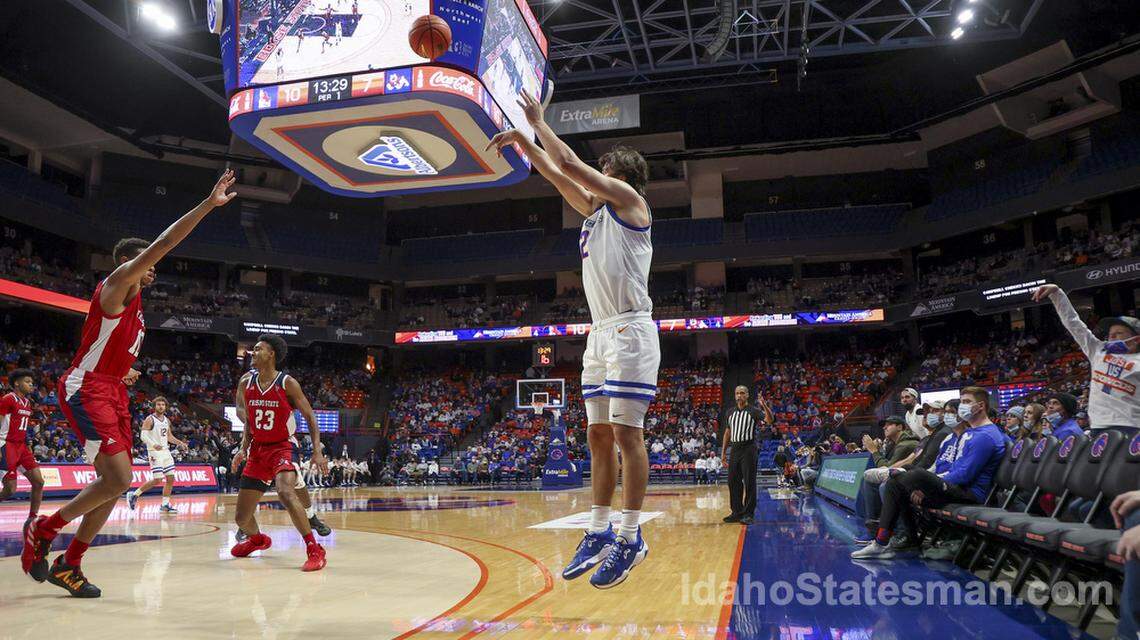 Boise State forward Tyson Degenhart hits a 3-pointer in the first half against Fresno State in the Broncos’ Mountain West Conference opener Tuesday, Dec. 28, 2021 at ExtraMile Arena in Boise.