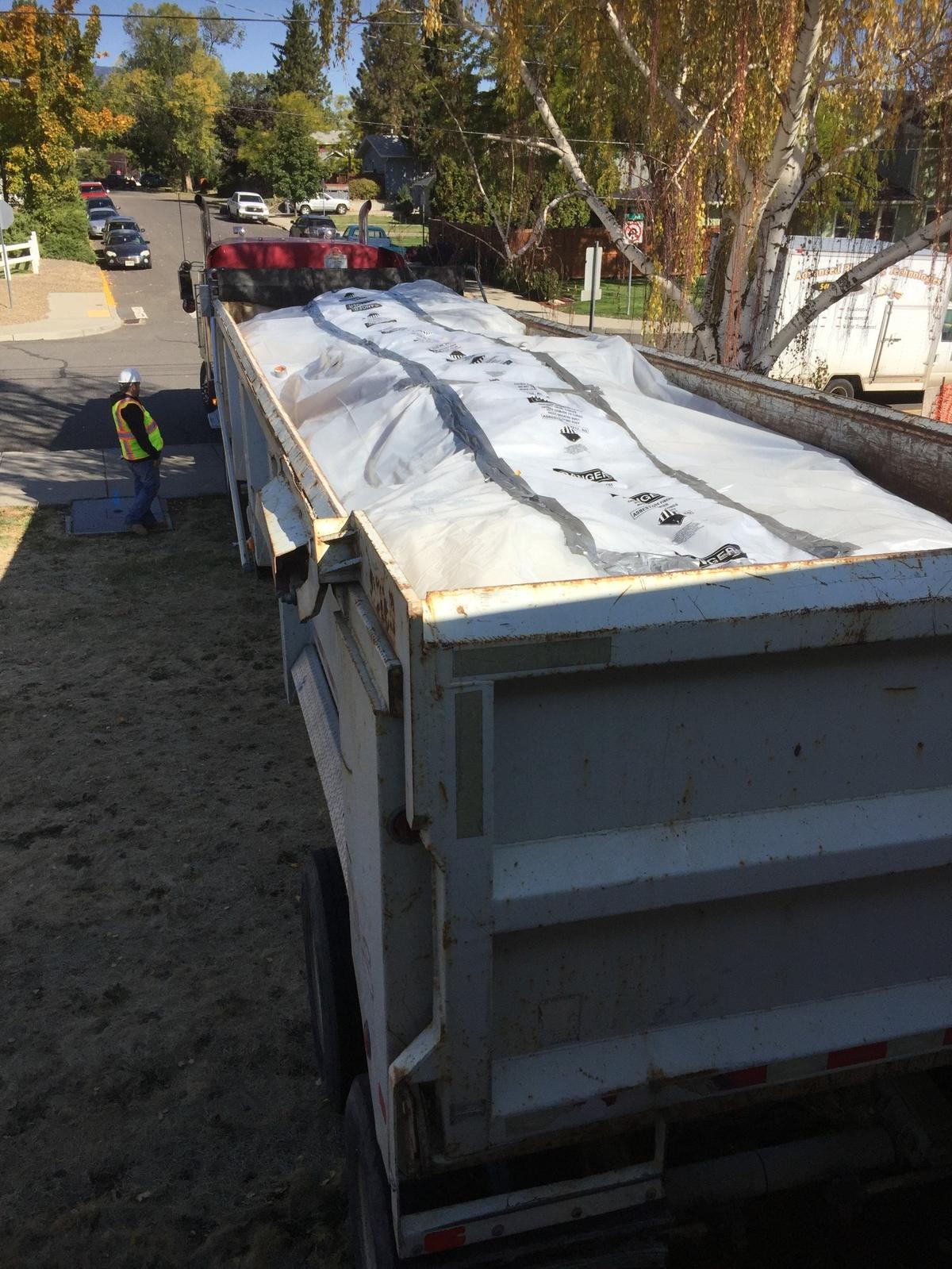 To abate a building with asbestos, work crews must bag all asbestos-containing material before taking it to a landfill, as shown in this image supplied by Josh Woodard, a co-owner of Boise’s Abatement Pro. No asbestos testing is required in Boise for individual home demolitions, meaning crews could unwittingly transport unbagged asbestos-containing materials.