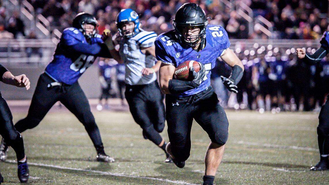 Nick Romano rushed for 205 yards and three touchdowns to lead Rocky Mountain to a 42-14 victory over Coeur d’Alene in the 5A state semifinals.