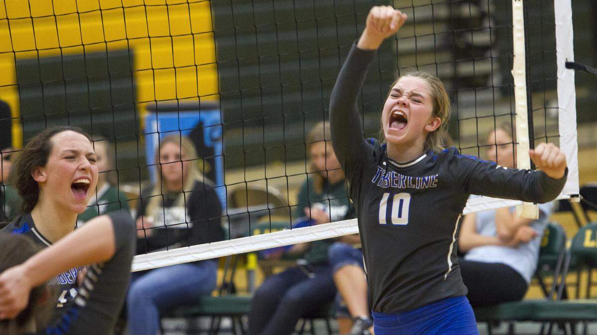Timberline setter Morgan Lamb celebrates with her teammates after a point in the 5A District Three volleyball championship last season at Borah High School.