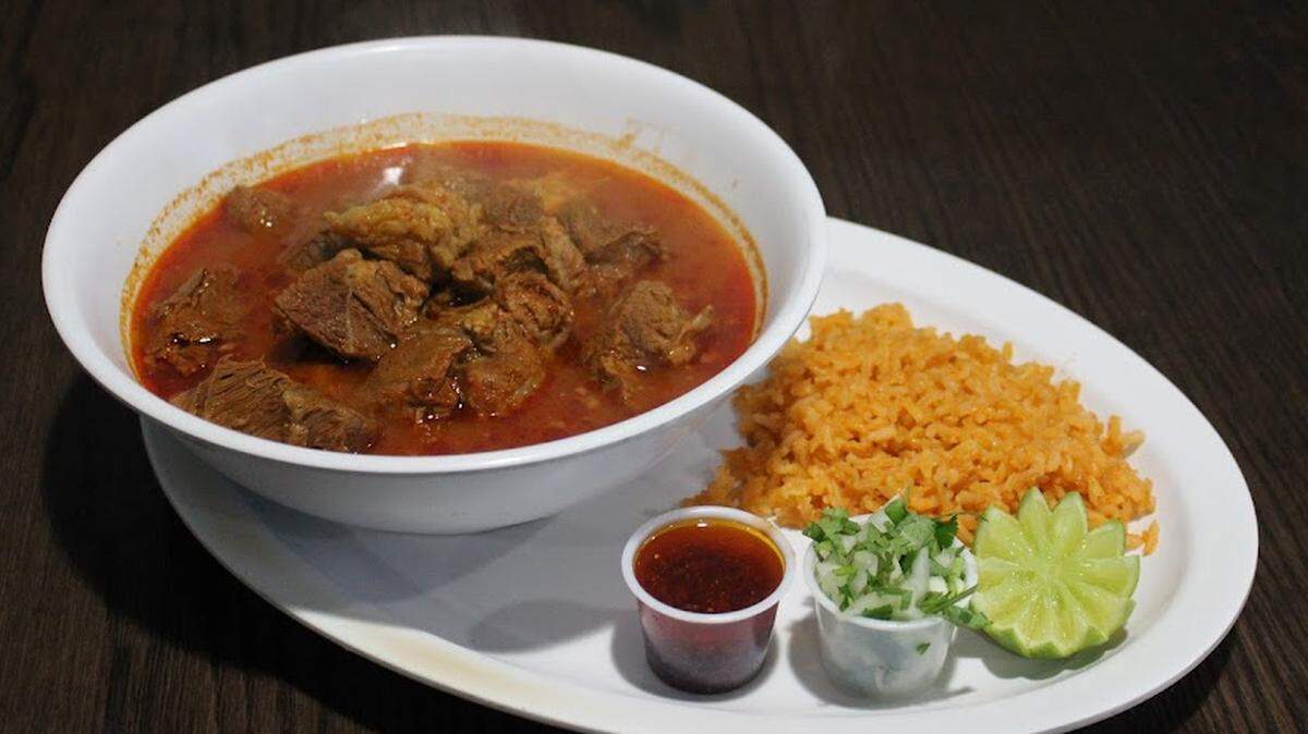 Birria ($14.49) is trendy. And tasty. It’s also tied with carne asada and caldo de res (a Mexican soup) for the priciest item on the menu.