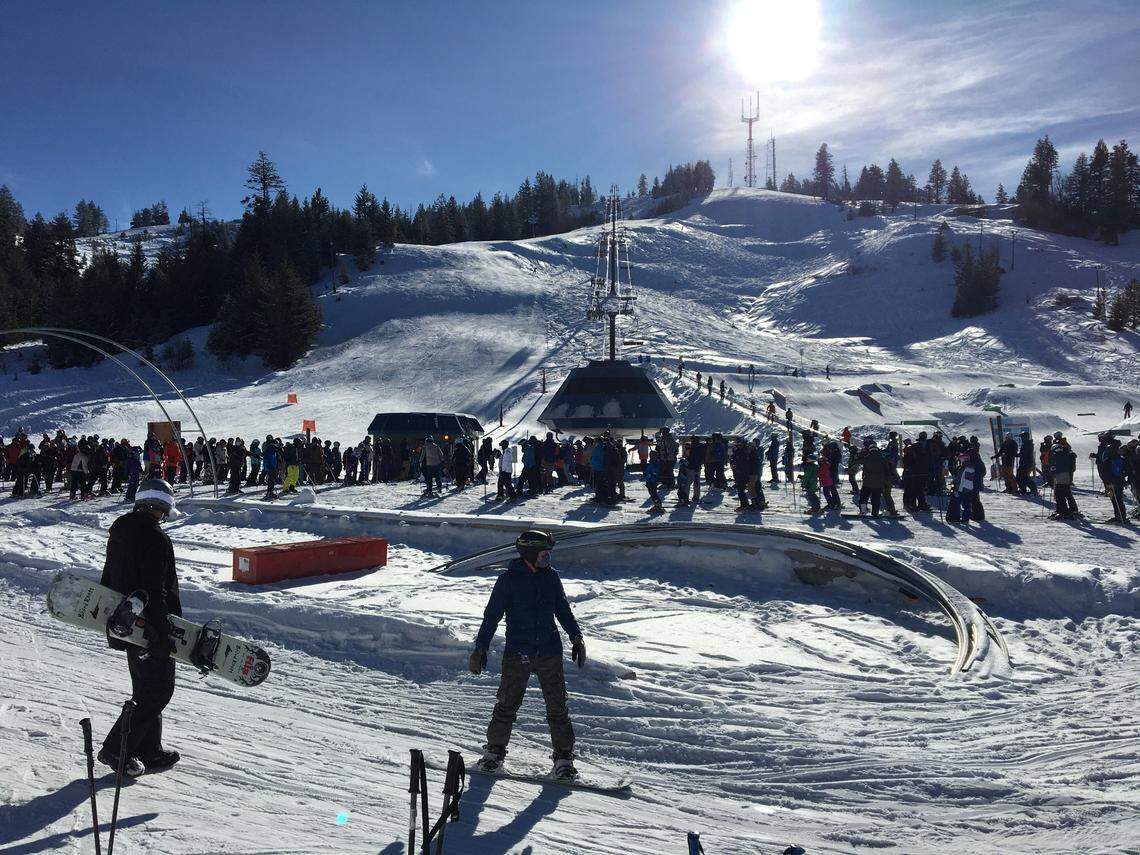 Skiers line up at the Deer Point chairlift at Bogus Basin Friday morning, Nov. 27, during the ski resort’s opening weekend event for season pass holders. The pass holder-only event was a thank you to pass holders as well as a test run of new COVID-19 safety protocols.